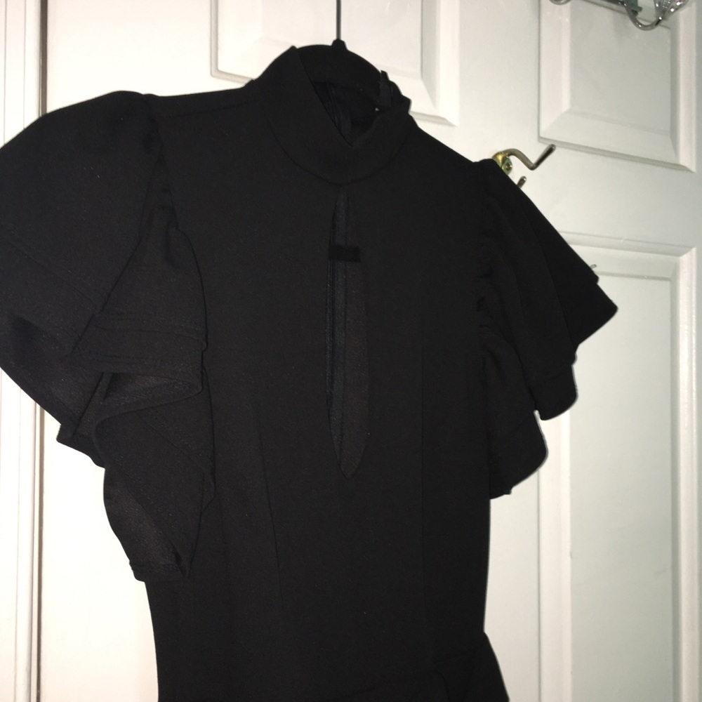 Black ruffled sleeve jumper, worn once